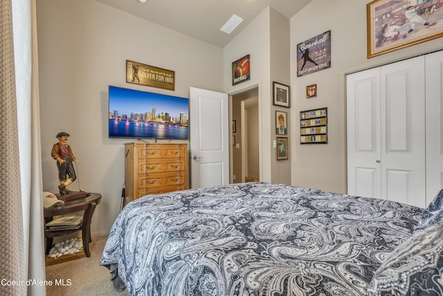 carpeted bedroom with a closet and visible vents