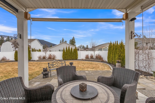 view of patio / terrace featuring outdoor dining space and a fenced backyard