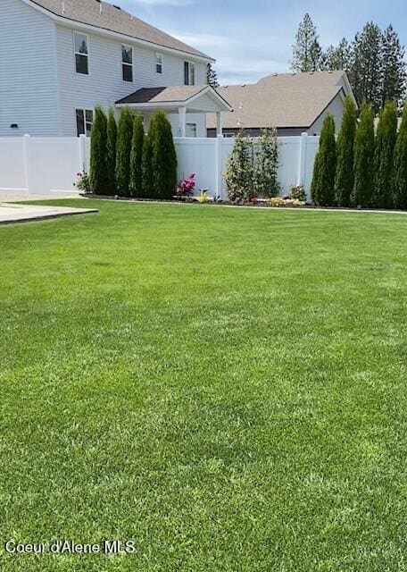 view of yard with fence