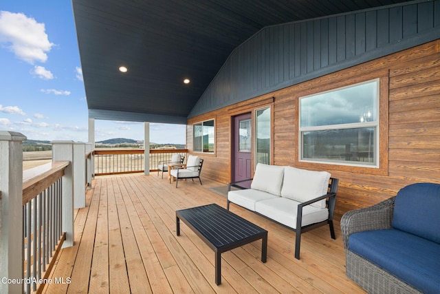 wooden deck with outdoor lounge area