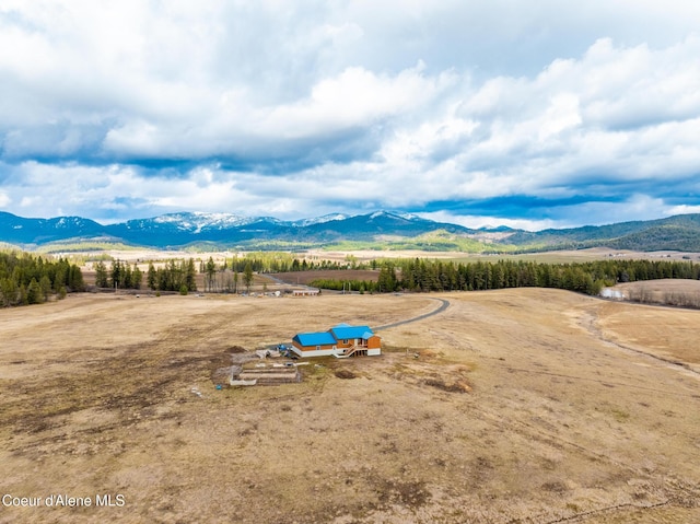 property view of mountains featuring a rural view