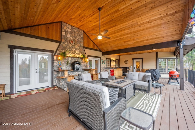 living area featuring french doors, wooden ceiling, and hardwood / wood-style floors