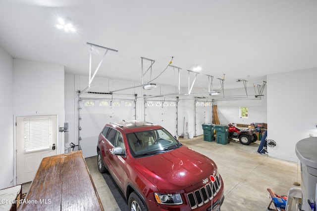 garage featuring a garage door opener