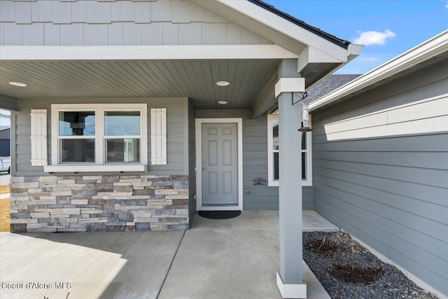 entrance to property with a porch