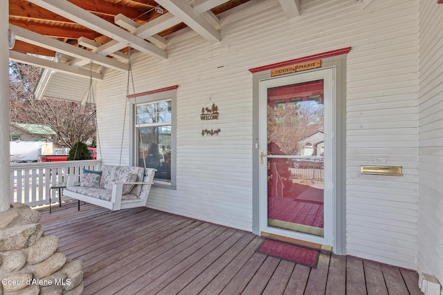 wooden deck featuring a porch