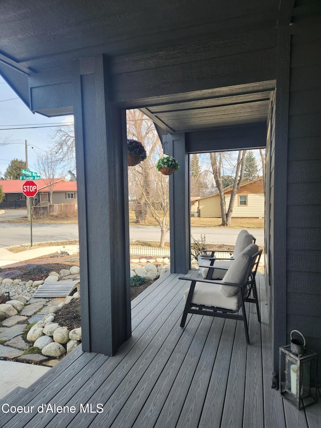 wooden deck featuring a porch