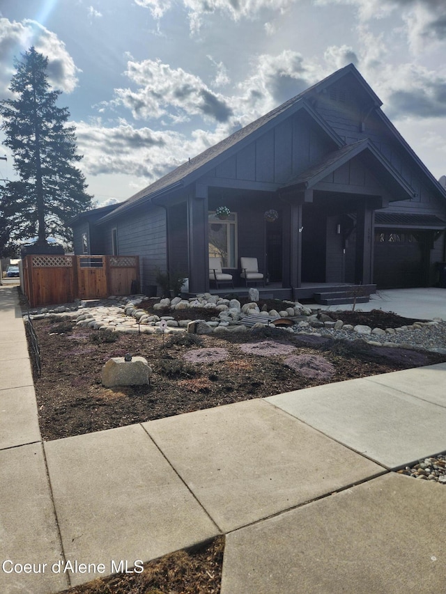 view of front of home featuring covered porch and board and batten siding