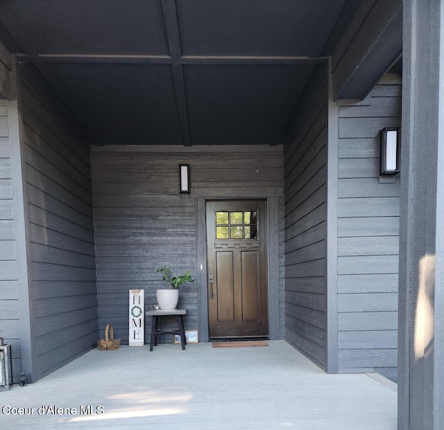 entrance to property with a porch