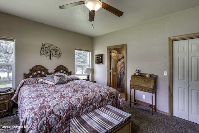 bedroom featuring baseboards, carpet floors, and ceiling fan