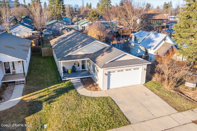 drone / aerial view featuring a residential view