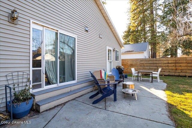 view of patio / terrace featuring fence