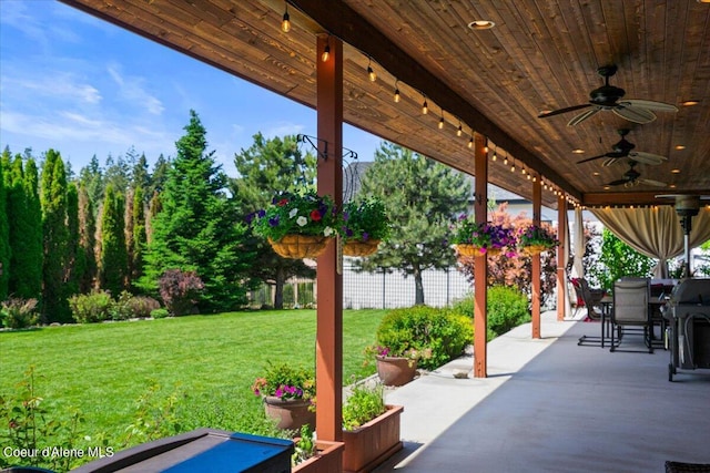 view of patio / terrace featuring outdoor dining area, a ceiling fan, and fence