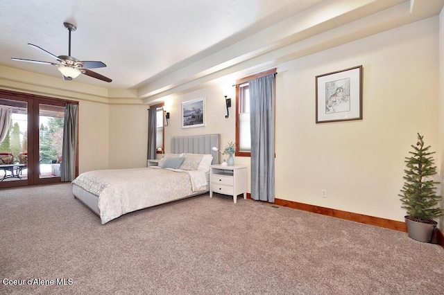 carpeted bedroom with baseboards, access to exterior, and a ceiling fan