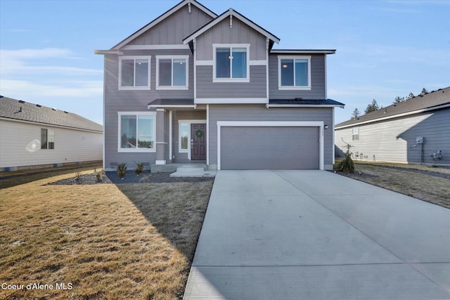 view of front of property featuring a garage, board and batten siding, concrete driveway, and a front yard