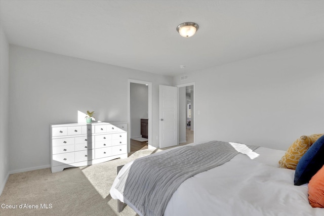 bedroom featuring carpet, visible vents, and baseboards