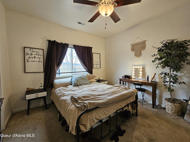 4346 N Brookie Dr, Post Falls, ID 83854 - bedroom featuring baseboards, carpet flooring, visible vents, and a ceiling fan