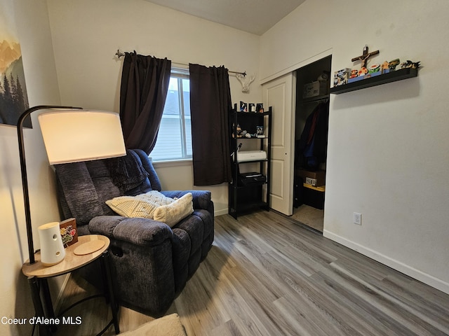 4346 N Brookie Dr, Post Falls, ID 83854 - living area featuring baseboards and wood finished floors