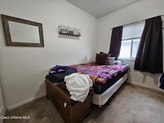 4346 N Brookie Dr, Post Falls, ID 83854 - carpeted bedroom featuring baseboards