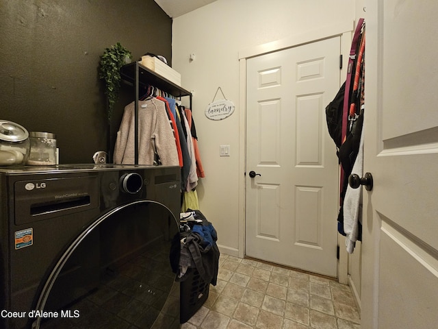 4346 N Brookie Dr, Post Falls, ID 83854 - clothes washing area featuring baseboards and laundry area