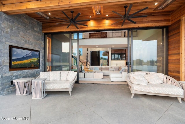 view of patio featuring outdoor lounge area and a ceiling fan