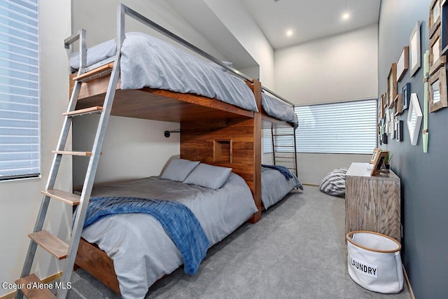 bedroom with recessed lighting and carpet floors