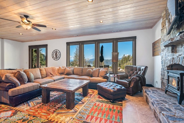 tiled living room with a ceiling fan, wooden ceiling, and recessed lighting