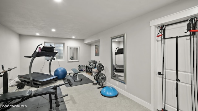 exercise area featuring recessed lighting, carpet, and baseboards