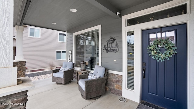 property entrance featuring a porch