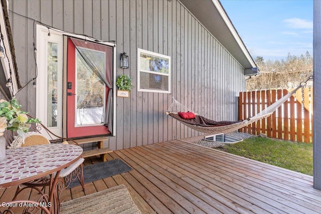 wooden deck featuring fence