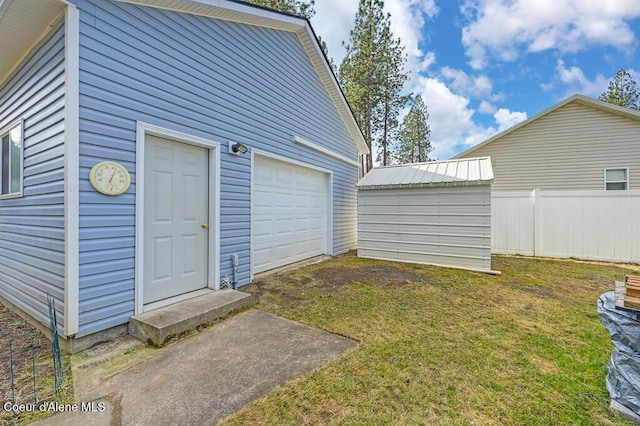 garage featuring fence