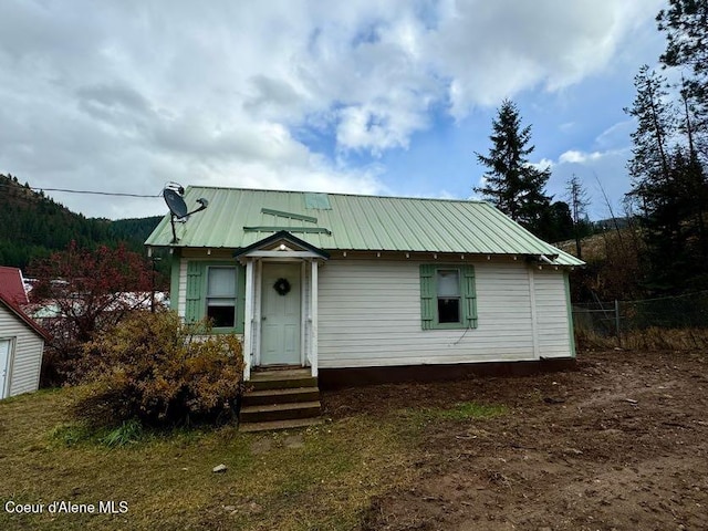 view of front of property with metal roof