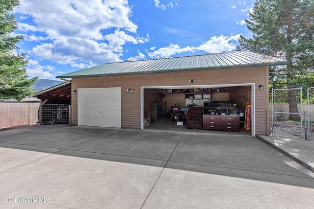 garage with fence