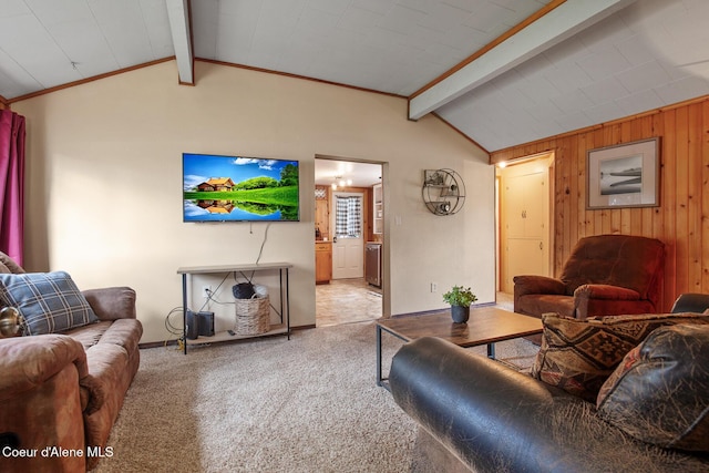 living area with lofted ceiling with beams, baseboards, light colored carpet, and wooden walls