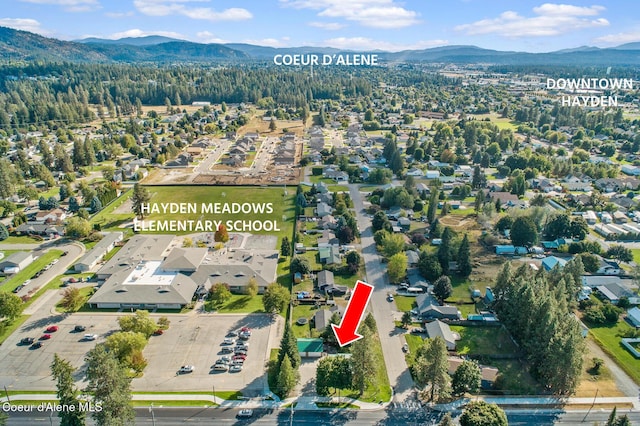 bird's eye view featuring a residential view and a mountain view