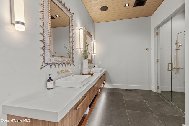 full bath with tile patterned flooring, double vanity, wood ceiling, and a sink