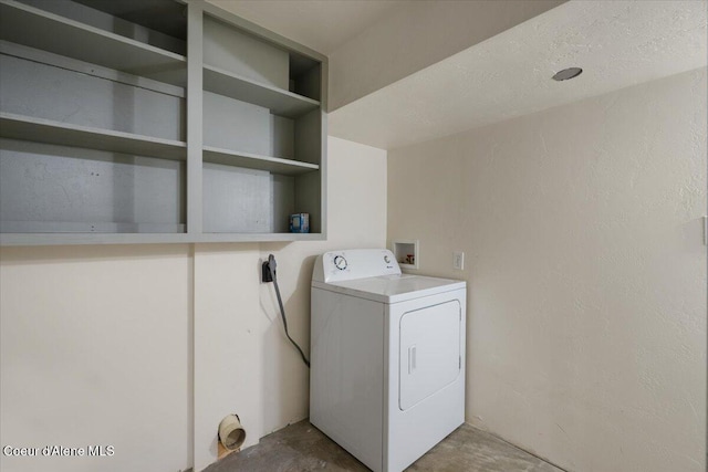 laundry area featuring laundry area and washer / clothes dryer