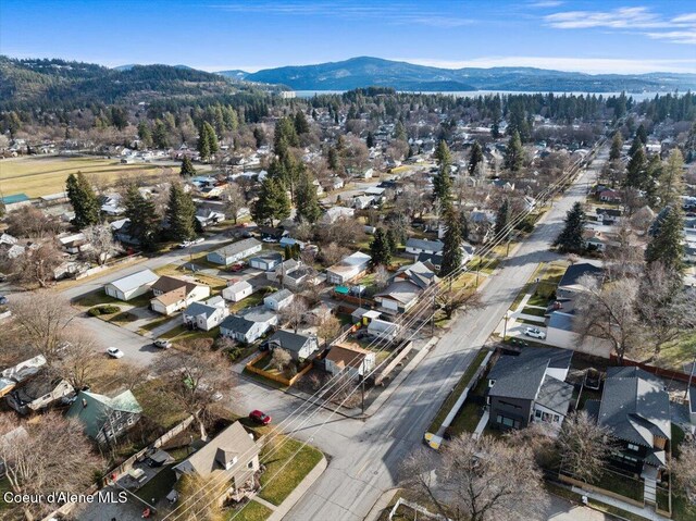 drone / aerial view featuring a mountain view and a residential view