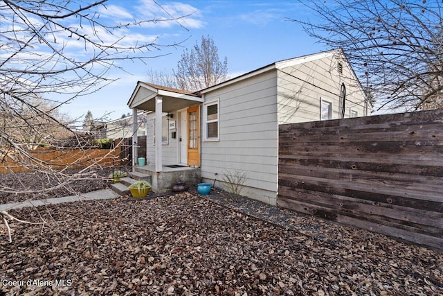 view of side of property with fence