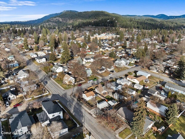 birds eye view of property with a mountain view and a residential view