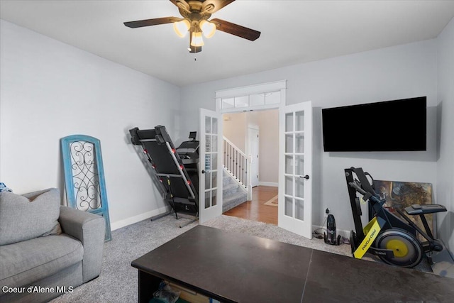 exercise room with ceiling fan, french doors, and baseboards