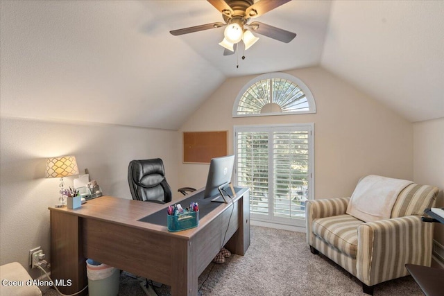 home office featuring a wealth of natural light, a ceiling fan, carpet flooring, and vaulted ceiling