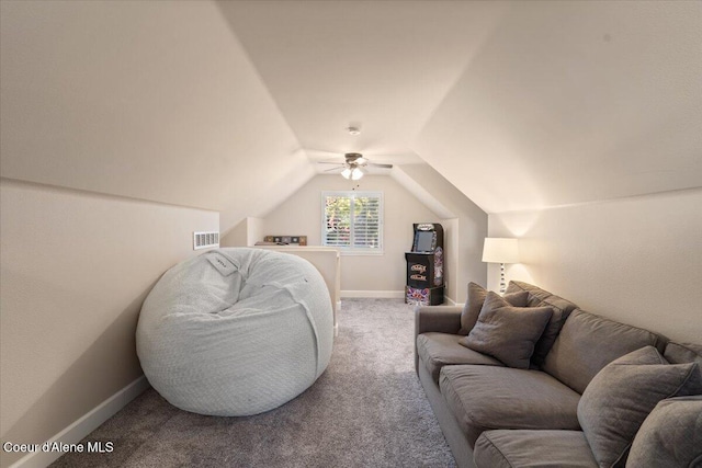 bedroom with visible vents, baseboards, vaulted ceiling, carpet flooring, and a ceiling fan