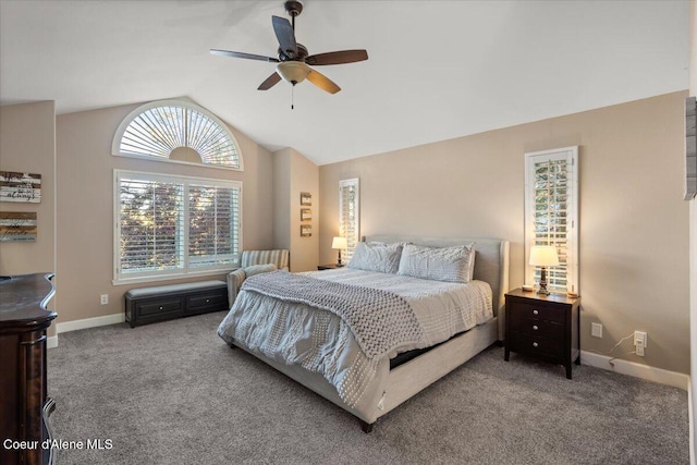 carpeted bedroom featuring baseboards, ceiling fan, and vaulted ceiling