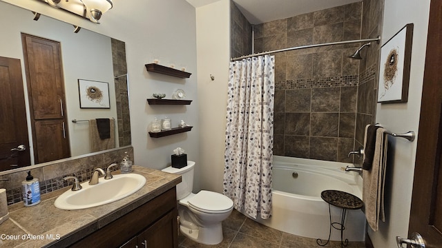 bathroom with vanity, shower / bath combination with curtain, tile patterned floors, toilet, and tasteful backsplash