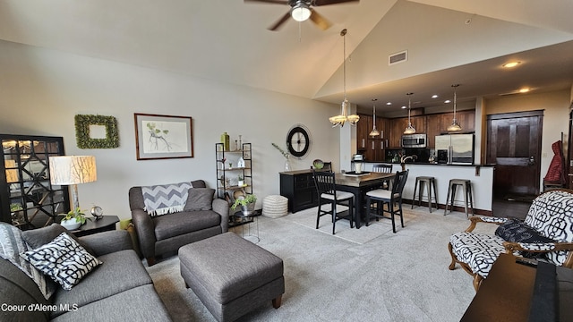 living area featuring visible vents, ceiling fan, light colored carpet, recessed lighting, and high vaulted ceiling