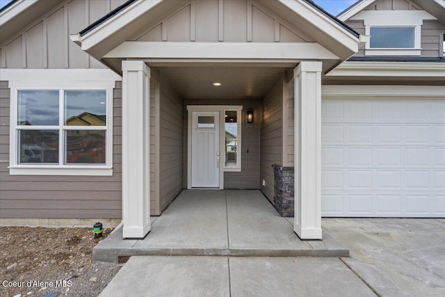 doorway to property featuring board and batten siding