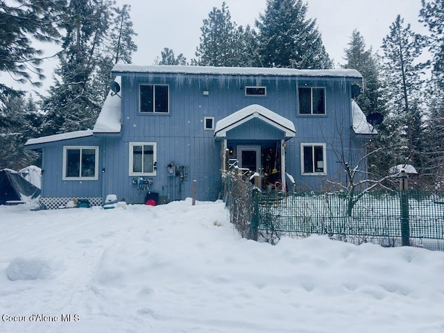 view of front of home with fence