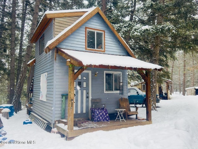 view of snow covered property