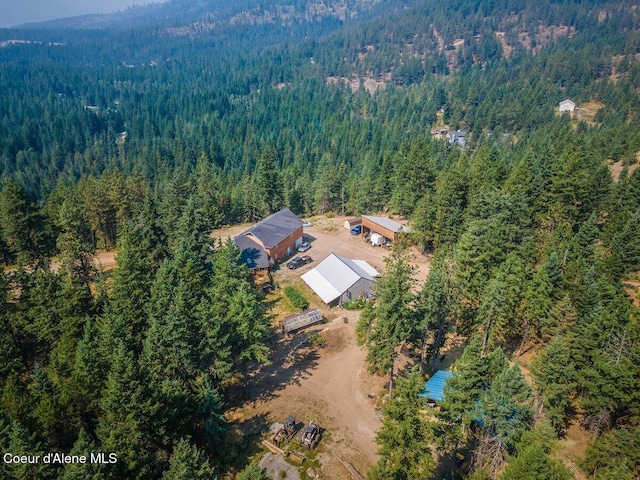 aerial view featuring a forest view