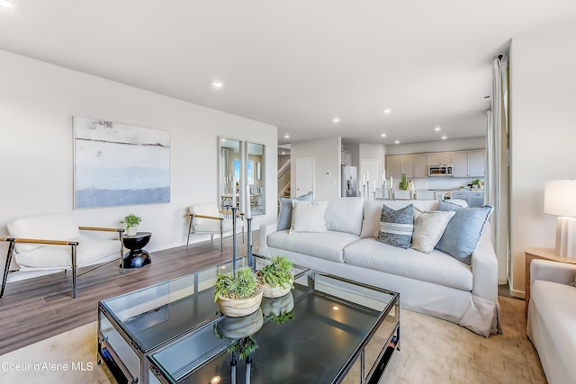 355 E Burdock Loop, Hayden, ID 83835 - living area featuring light wood finished floors and recessed lighting
